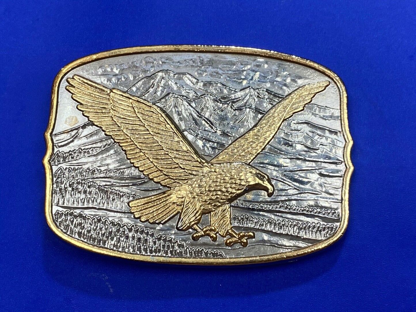 AMERICAN EAGLE Majestically hunting flying over mountains Numbered belt buckle