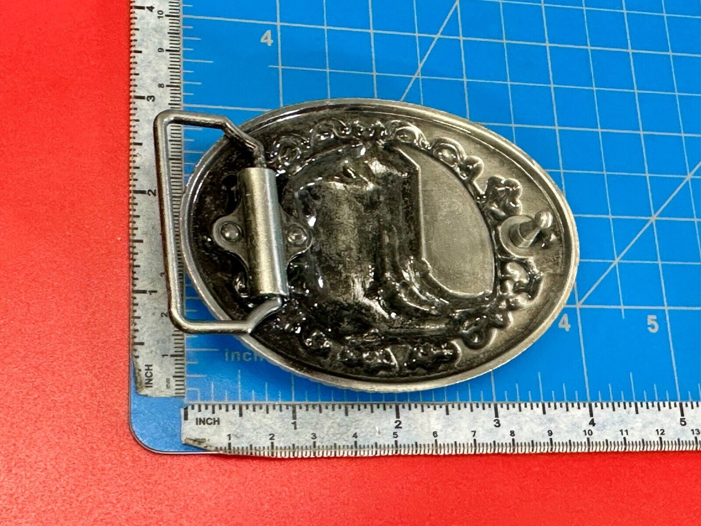 Western Cowboy Boots Belt Buckle with ornate flower swirl and rope boarder