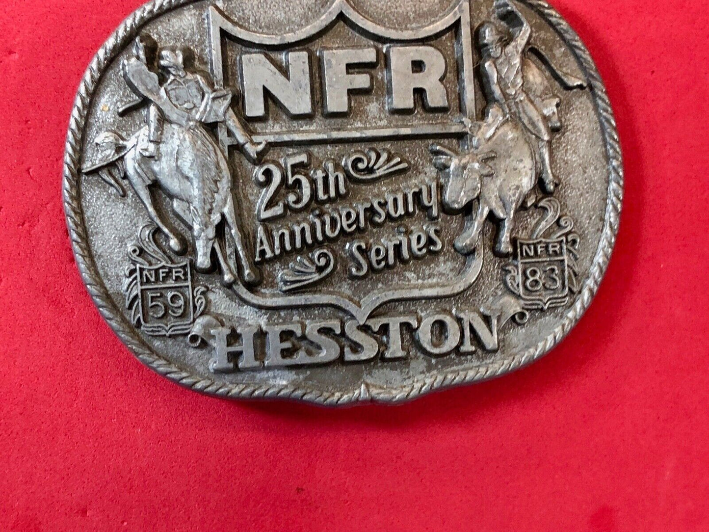 25th Anniversary 1959-1983 Hesston National Finals Rodeo belt buckle FIRST EDN.