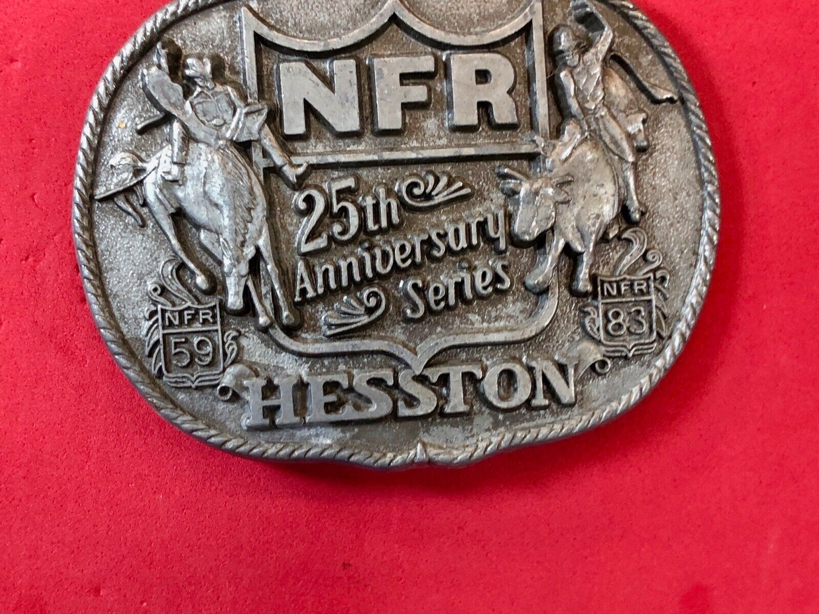 25th Anniversary 1959-1983 Hesston National Finals Rodeo belt buckle FIRST EDN.