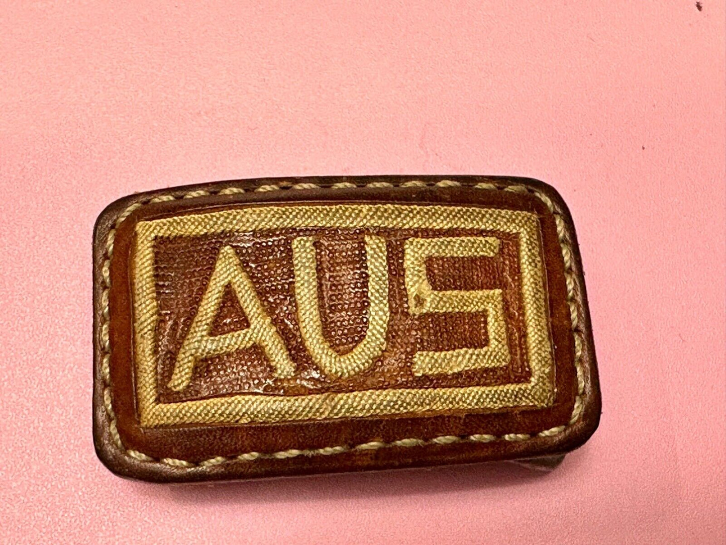 AUS  Brown leather with cream color Stitching  pre loved belt buckle