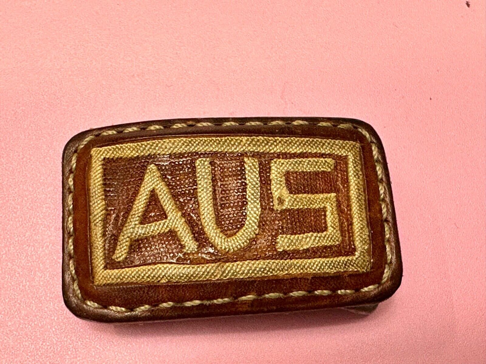 AUS  Brown leather with cream color Stitching  pre loved belt buckle