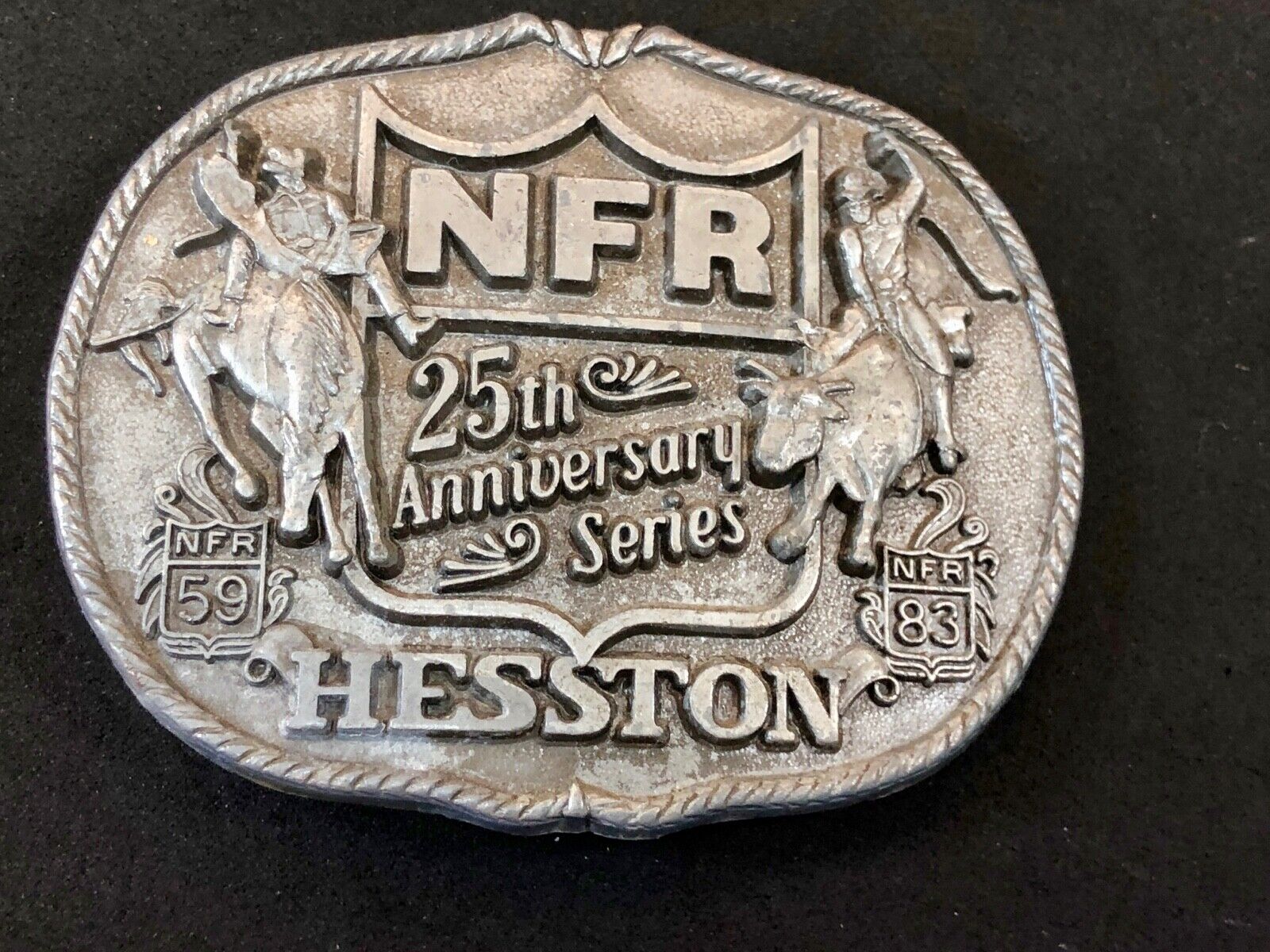 25th Anniversary 1959-1983 Hesston National Finals Rodeo belt buckle FIRST EDN.