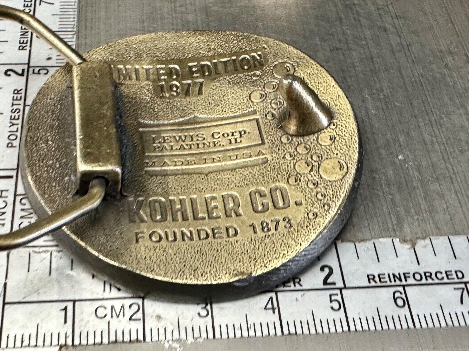 The Bold Look of Kohler - Vintage 1977 Lewis round Limited Edition belt buckle