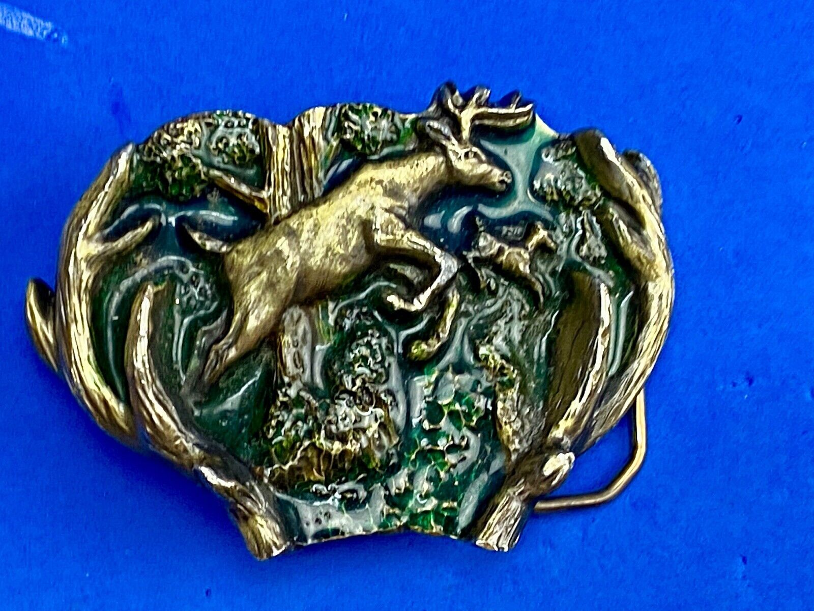 VINTAGE 1982 JUMPING DEER THROUGH ANTLERS - The Great American belt buckle Co. 