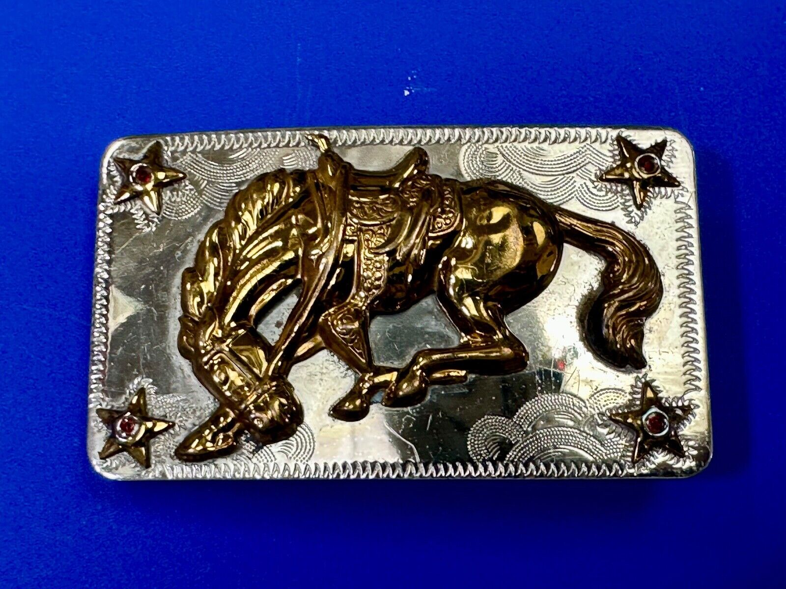 Vintage Horse w/  head down end of the trail Nickel Silver belt buckle w/ Stars