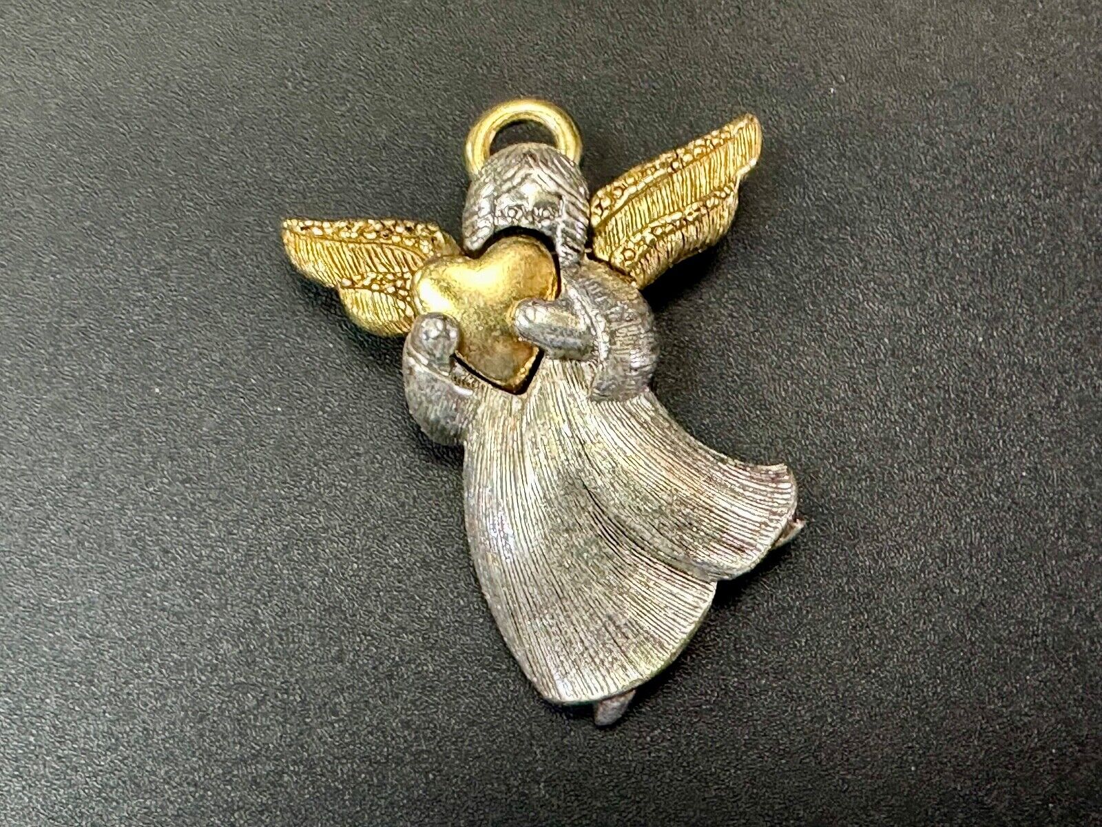 Angle holding heart -vintage two tone LC Liz Claiborne Signed Brooch Pin