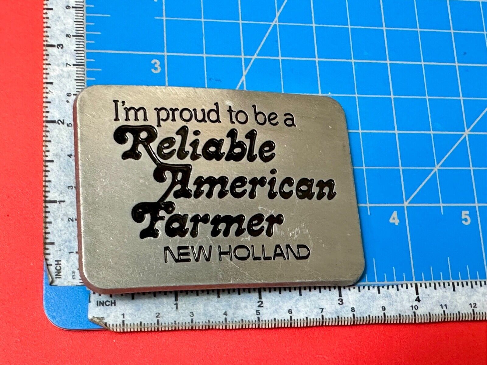 Vintage 1982 NEW HOLLAND I'm Proud to be a Reliable American Farmer Belt Buckle