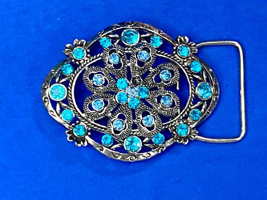 BEAUTIFUL BLUE rhinestones mounted in oval shaped flower theme belt buckle 