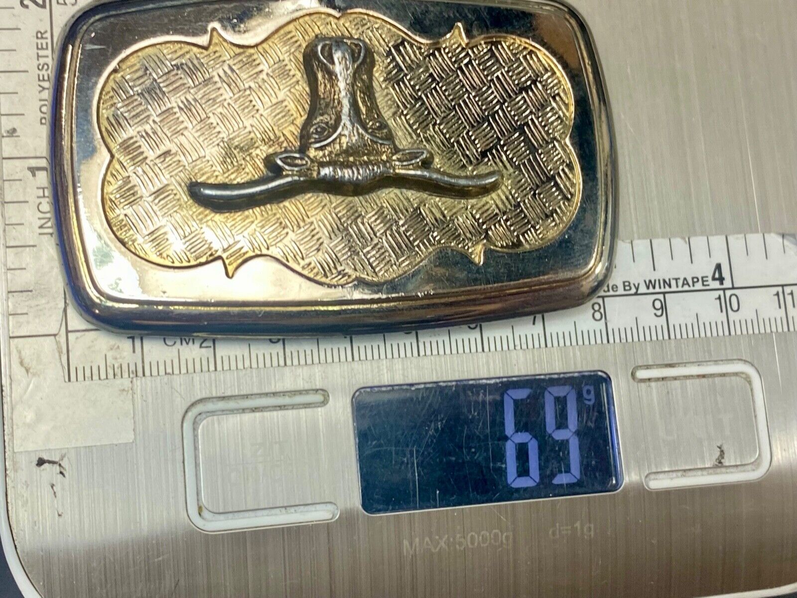Vintage gold tone Texas Longhorn Steer mesh background western belt buckle
