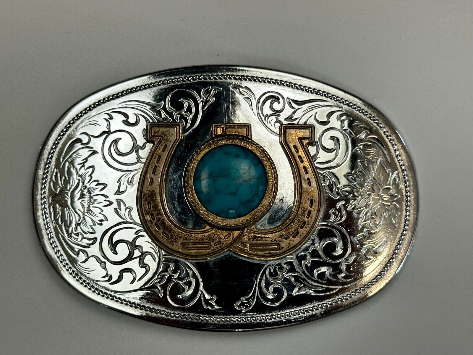 Turquoise centerpiece in  lucky horseshoe - two tone reflective belt buckle