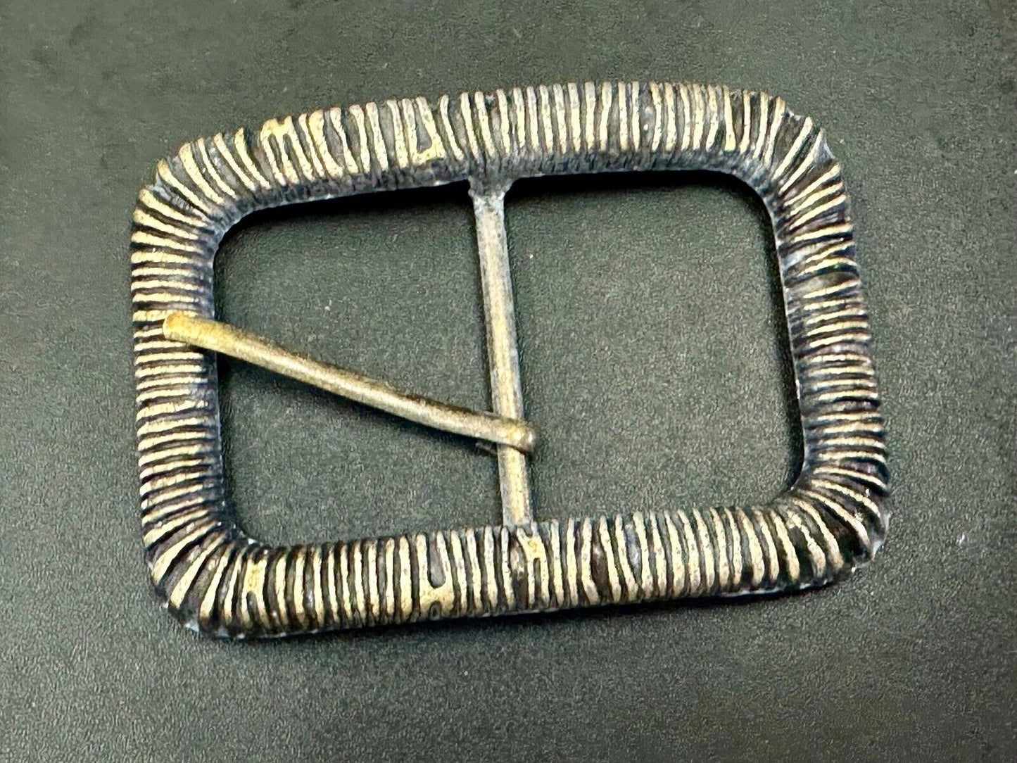 Unique Center Bar Spring abstracted wrapped style rectangular belt buckle