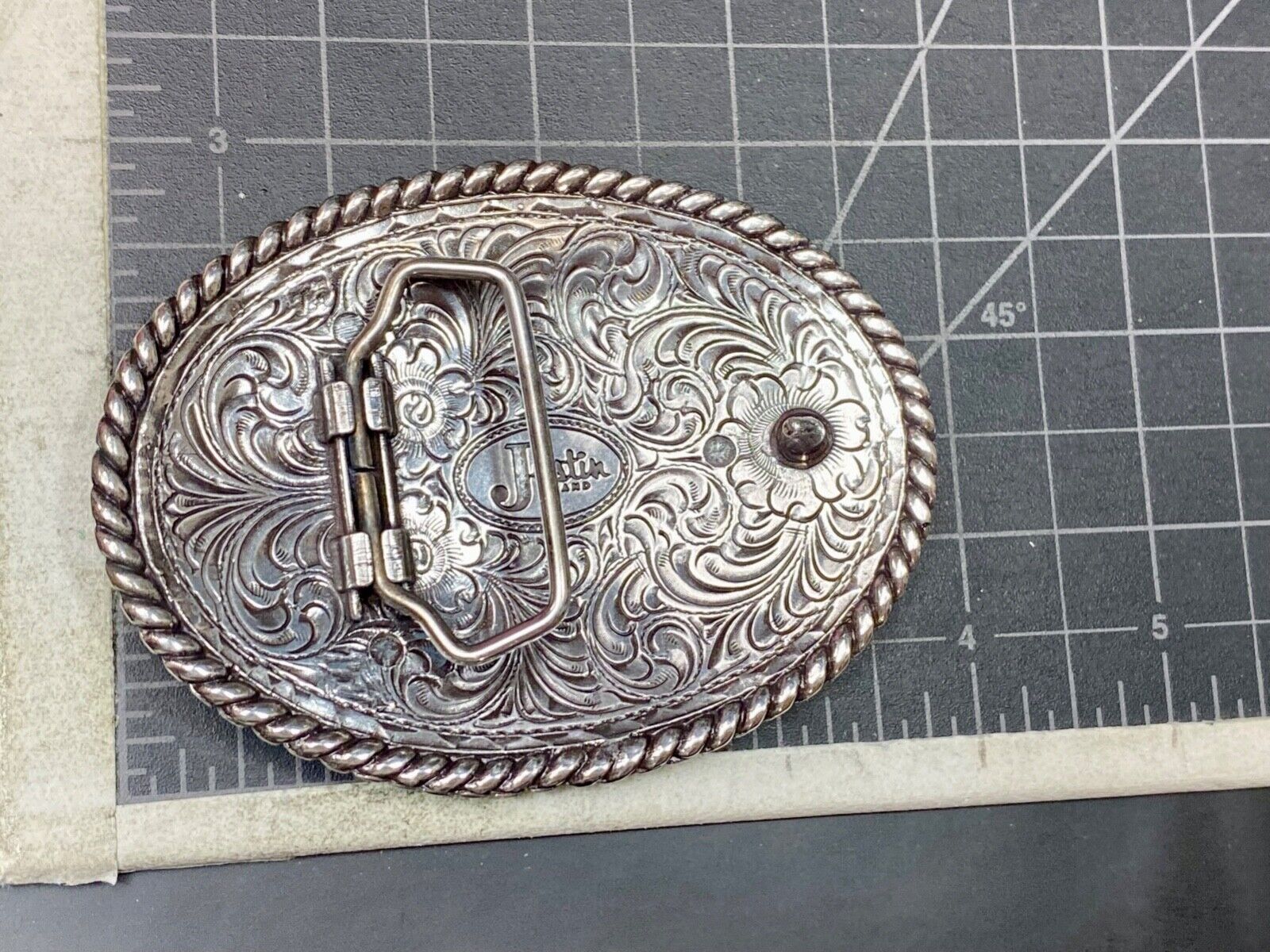 Vintage Justin Cowboys ornate flower swirl Belt Buckle with blank trophy scroll