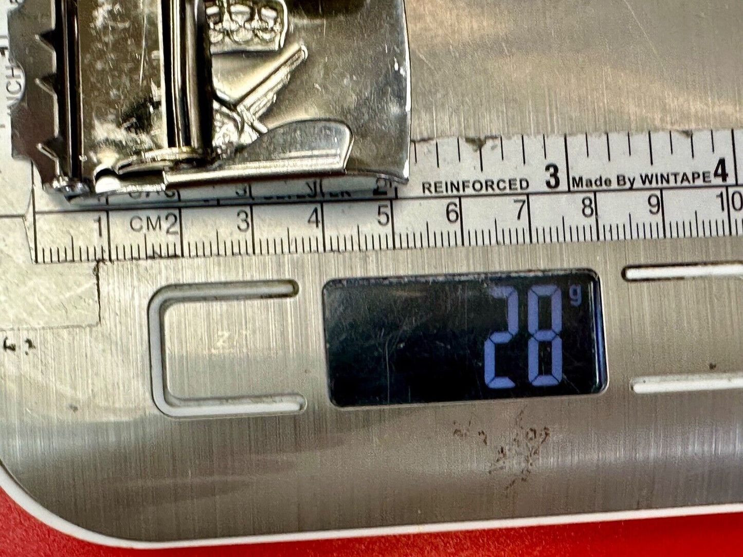 unknown to me!   dress style silver tone crown X crest? stamped belt buckle