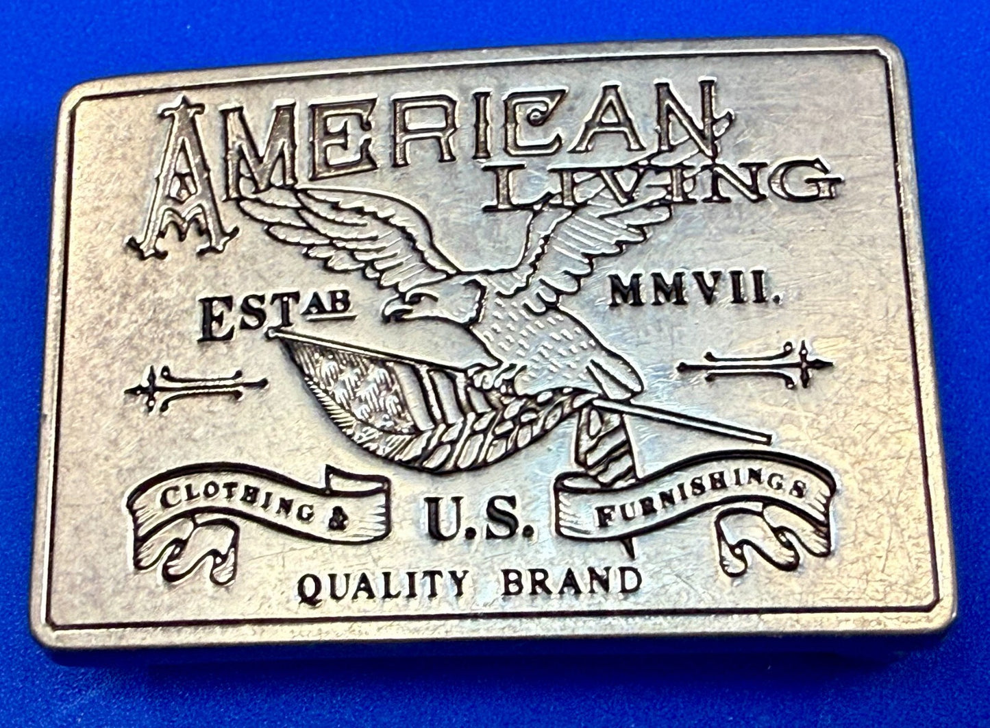 American Living Clothing & Furnishing U.S Quality Brand Promo Belt Buckle