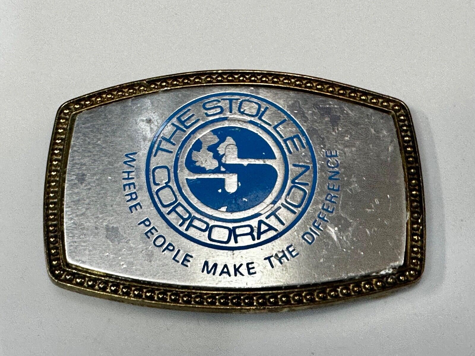The Stolle Corporation Where People Make The Difference Alumaline Belt Buckle