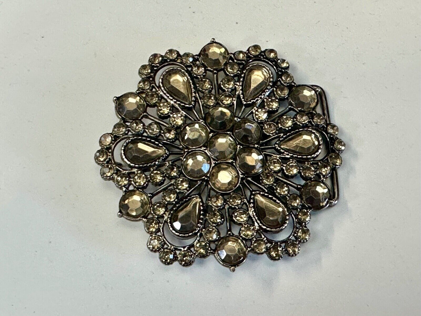 Vintage flowers star burst - multiple rhinestone's covering  belt buckle