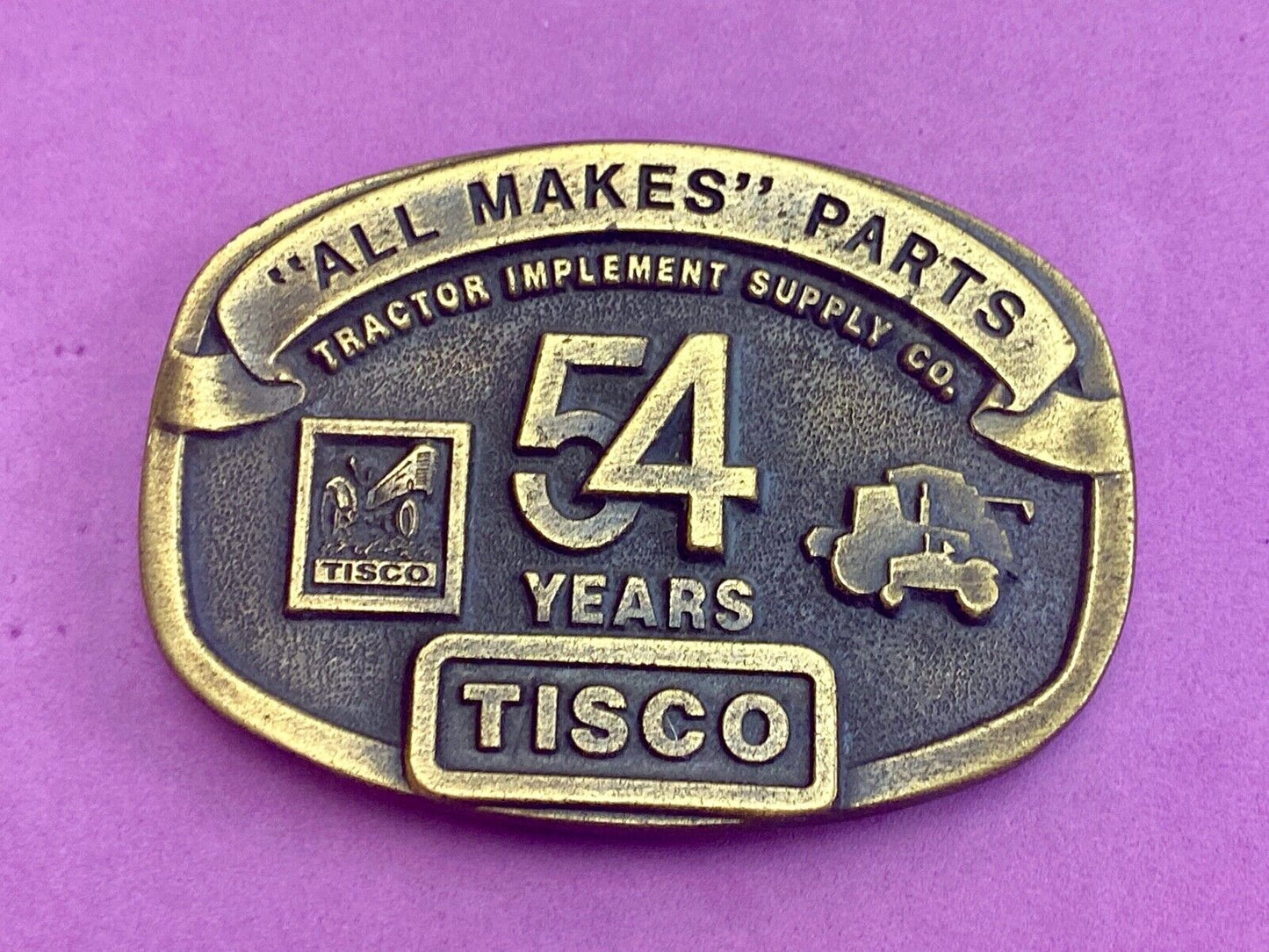 54 years Tisco Tractor Implement Supply Spec Cast Brass Belt Buckle series 2