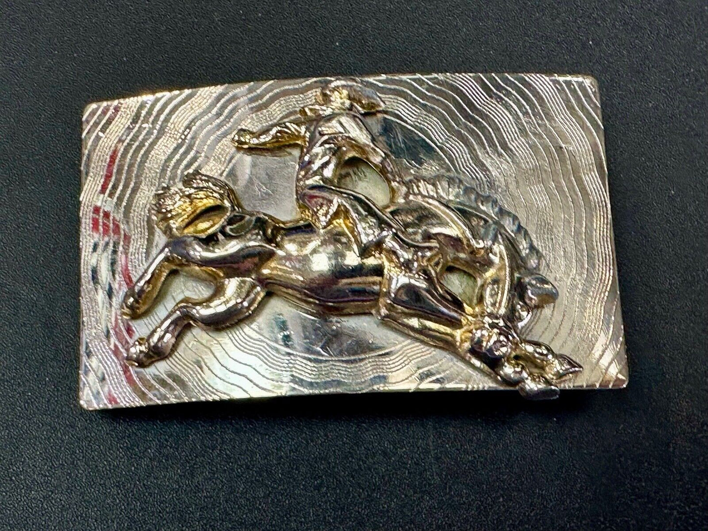 Trippy! Cowboy Saddle Bronc Horse Rider western Impact style belt buckle. - RARE