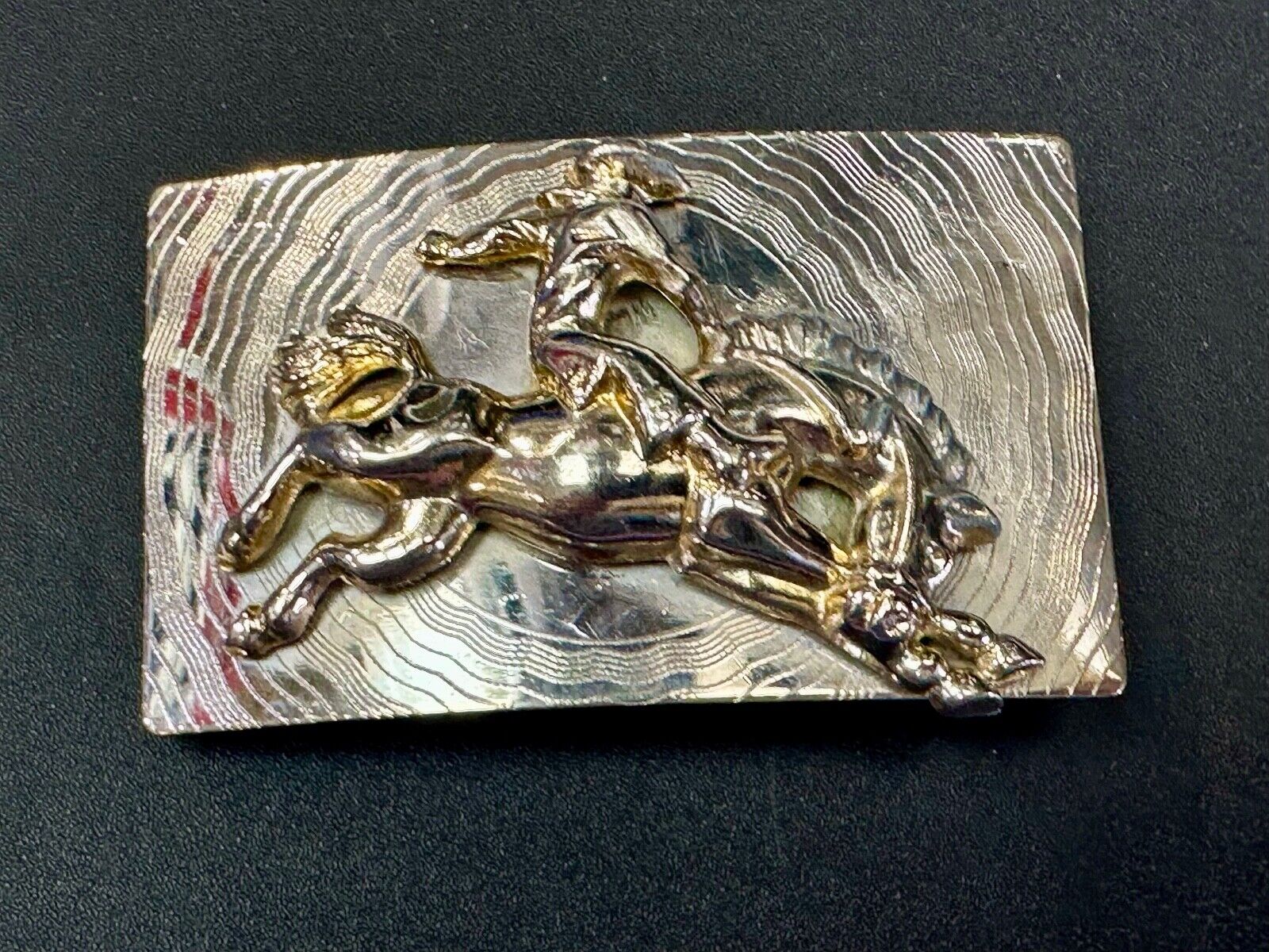 Trippy! Cowboy Saddle Bronc Horse Rider western Impact style belt buckle. - RARE