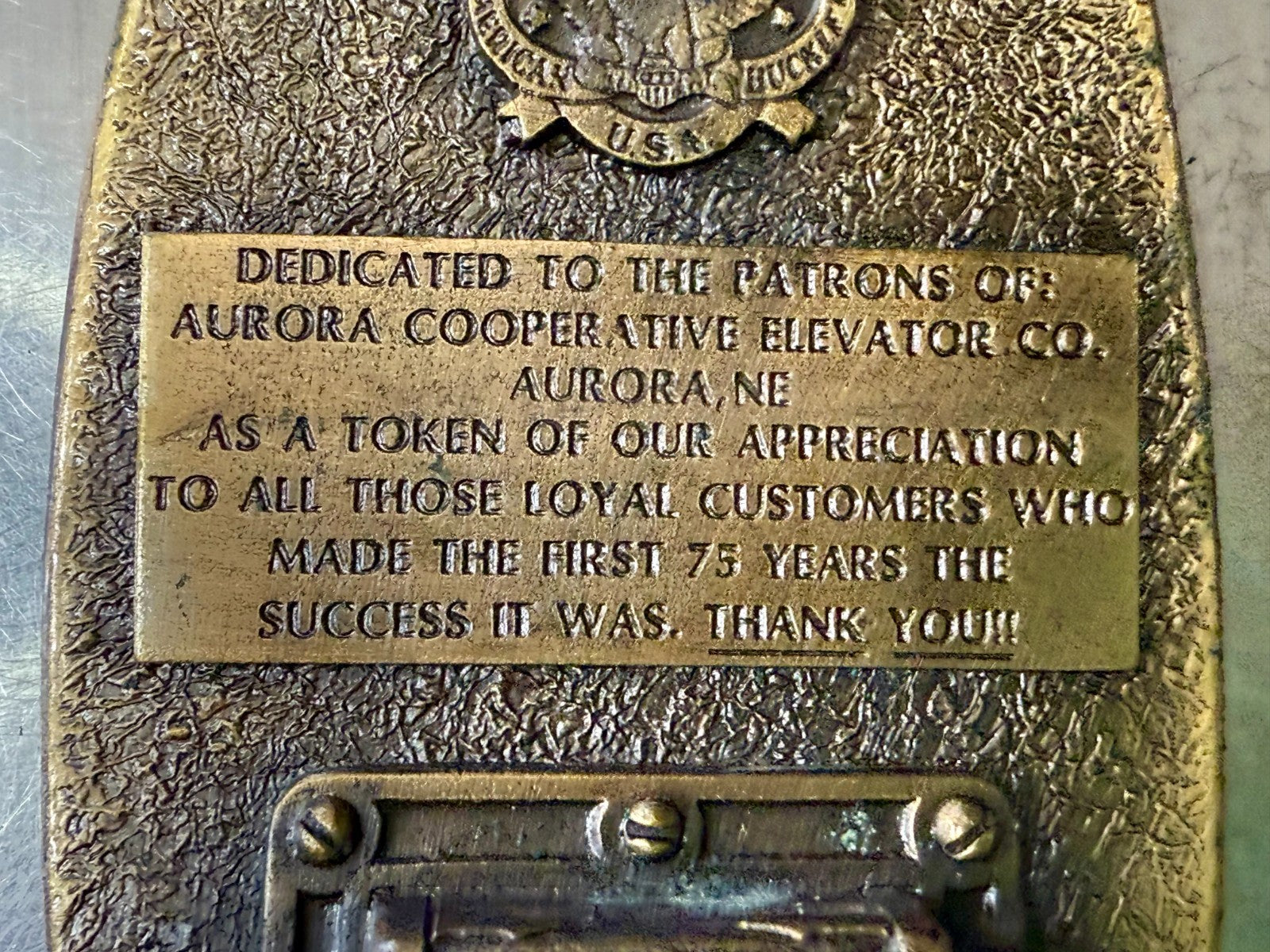 Aurora Co-Op Elevator Company at your Service 75th Anniversary Belt Buckle