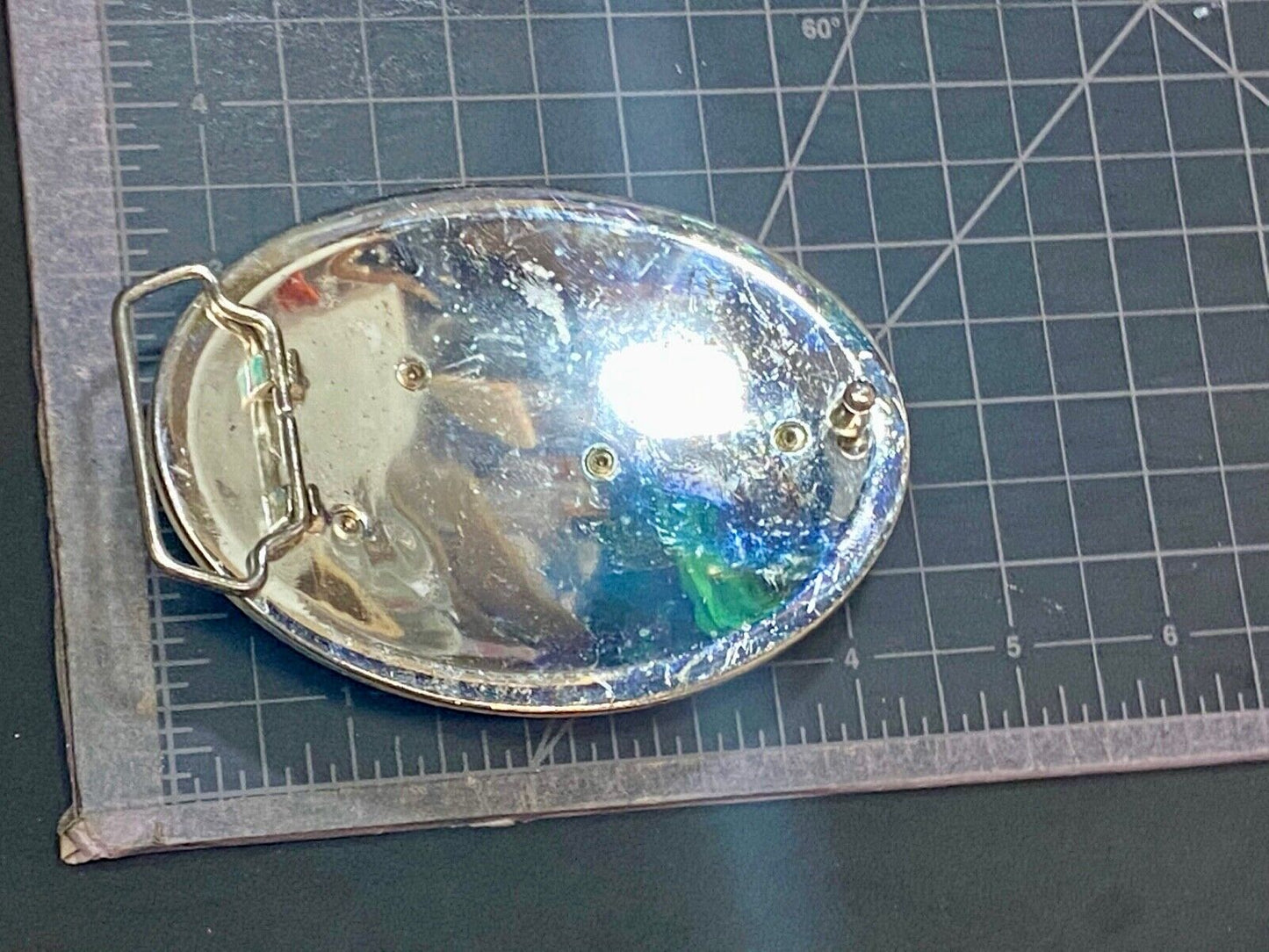 A big Tiger Cat running featured on western oval belt buckle 