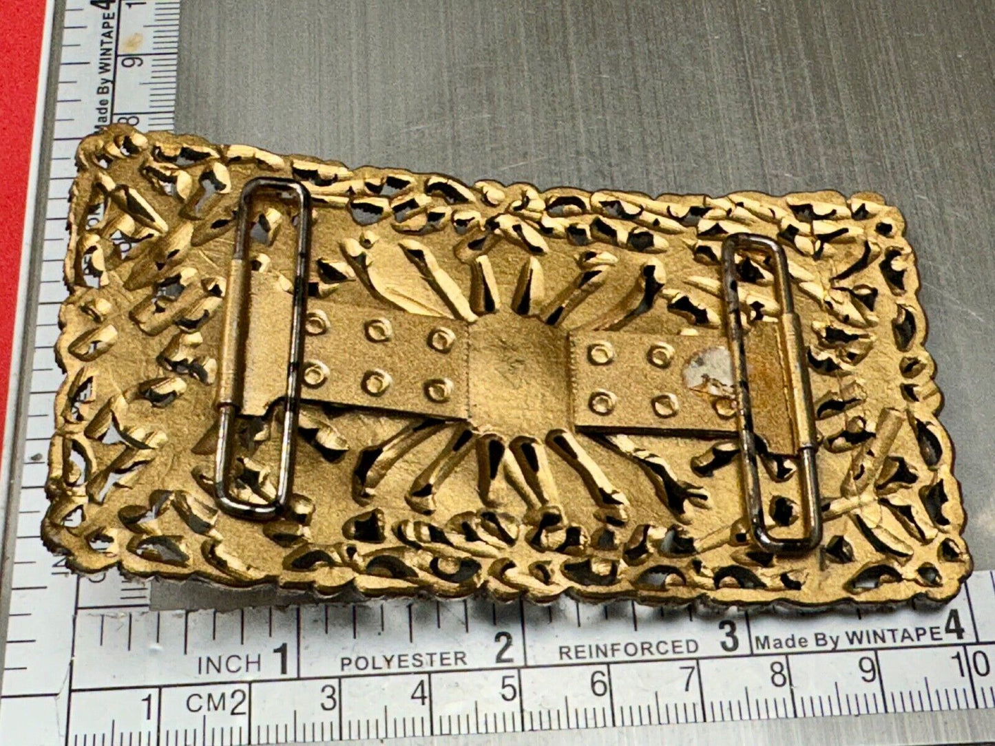 Antique gold tone? Flower theme Rhinestone covered scarf slide belt loupe buckle