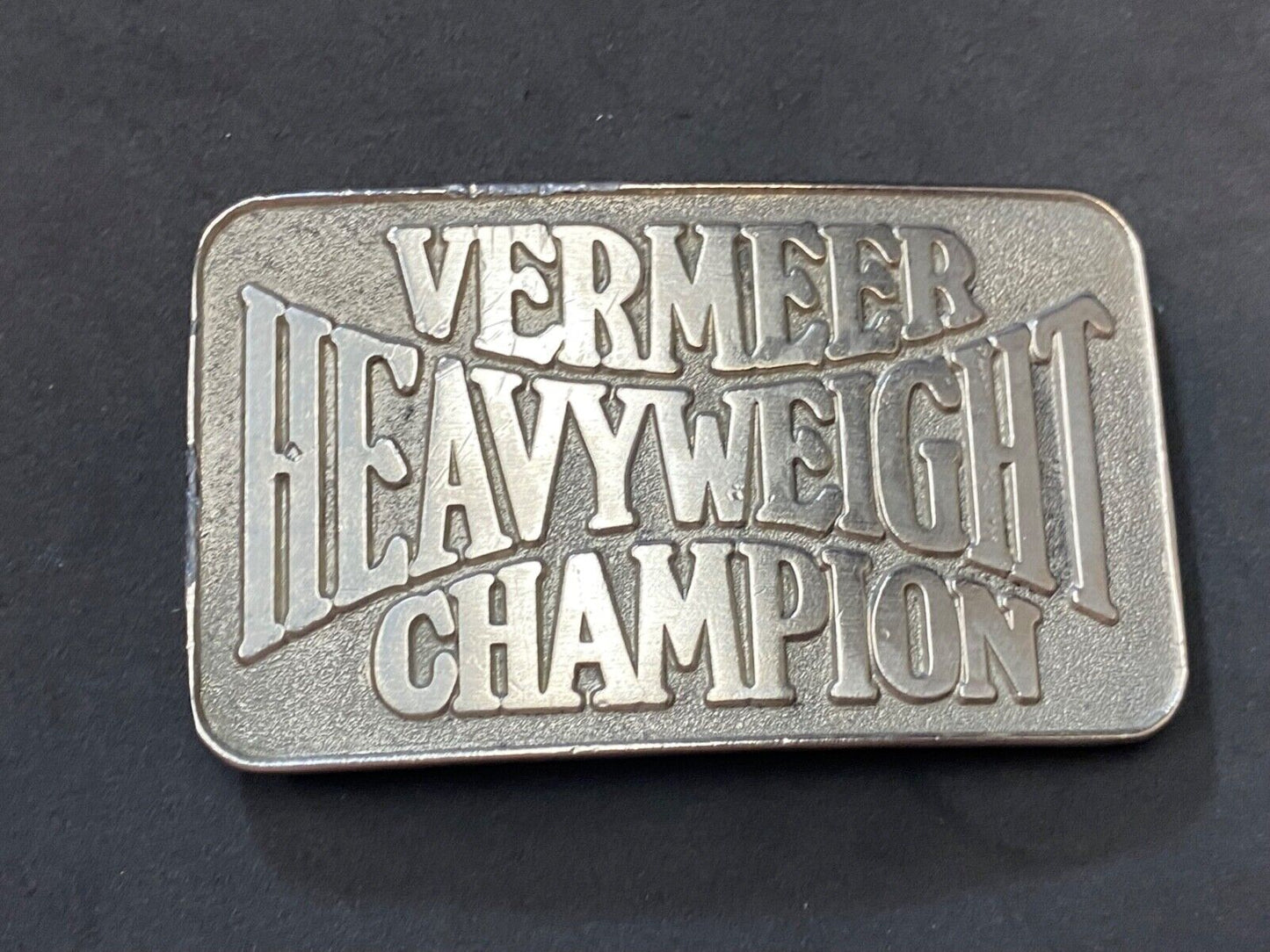Vermeer Heavyweight Champion Belt Buckle by Spec Cast