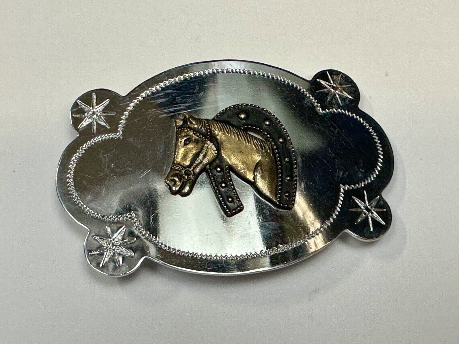 Vintage horse head in horseshoe cowboys cowgirls western belt buckle starbursts