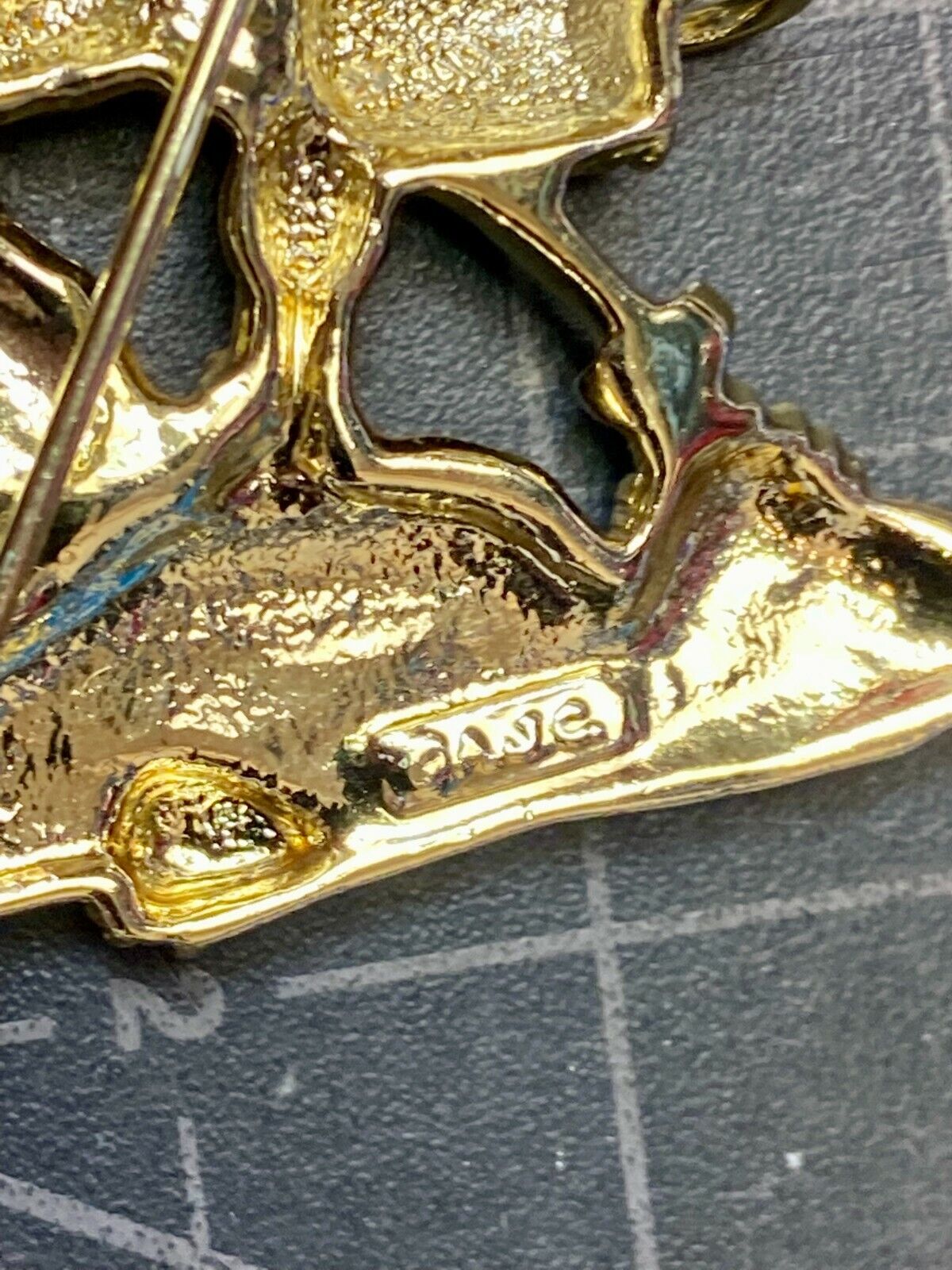 Angle Watering Flower Garden Plants Cupid Brooch Pin Signed AJC 