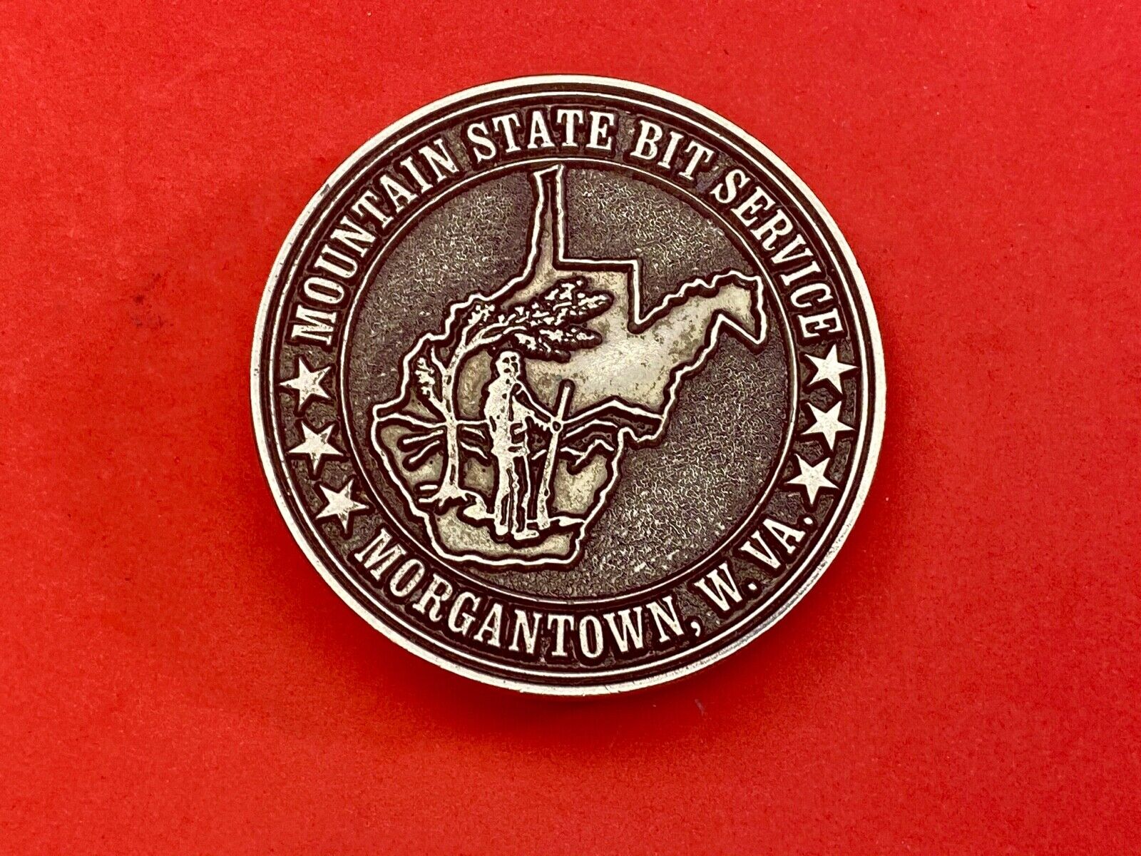 Vintage  Mountain State Bit Services Morgantown W.V. round belt buckle  by Lewis