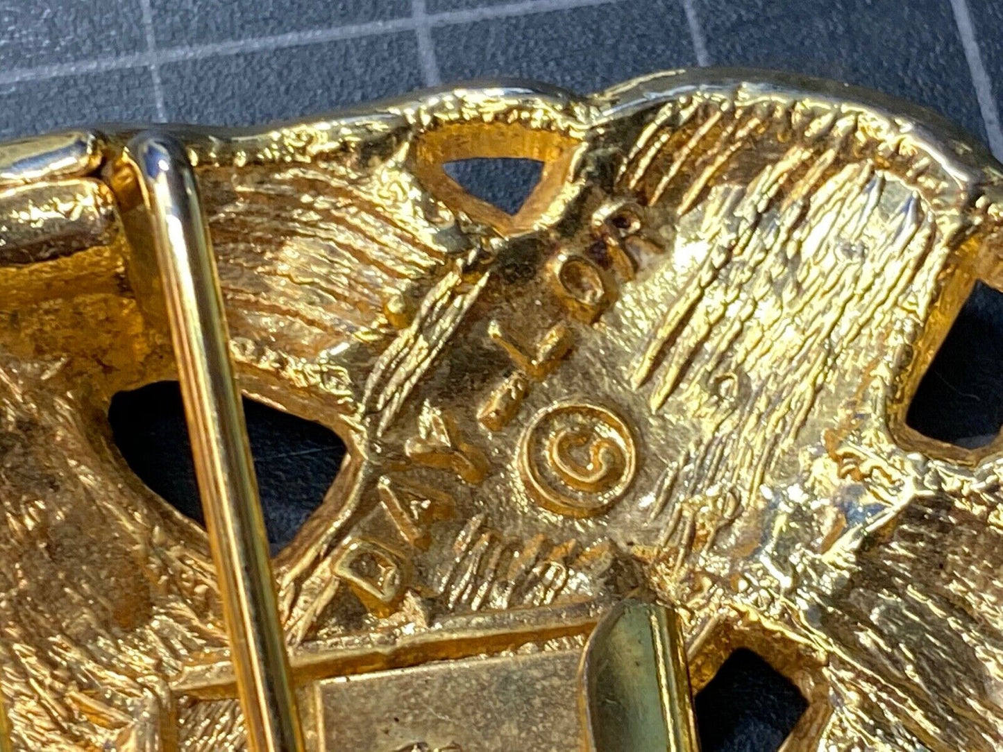 Vintage Day-Lor black and gold belt buckle 