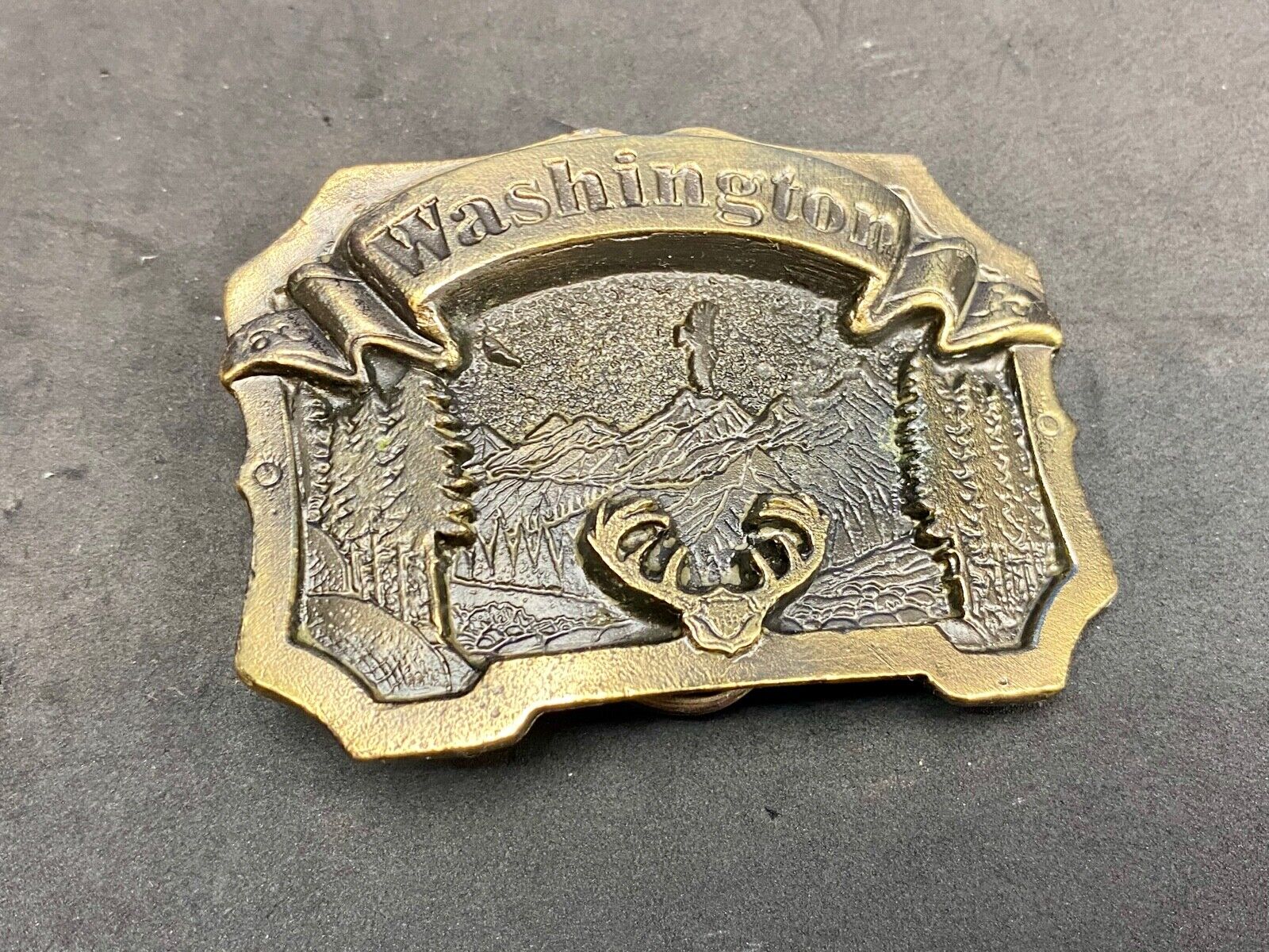Vintage 1980 The State Of Washington, Deer In Pine Tree Forrest Belt Buckle 