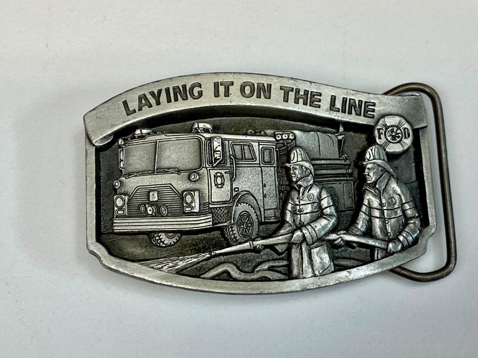 Vintage 1992, Laying it on the line fire department pewter belt buckle 
