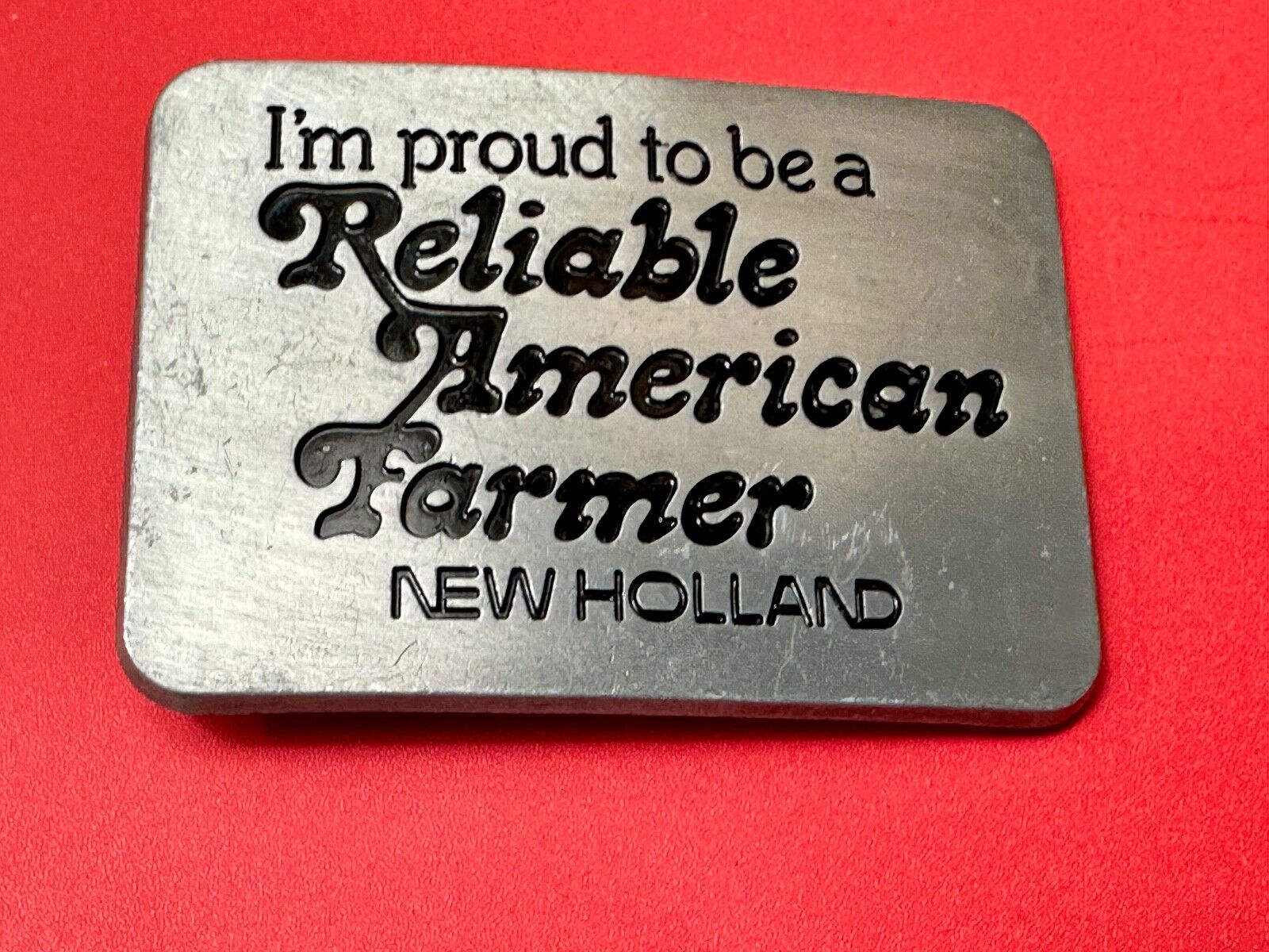 Vintage 1982 NEW HOLLAND I'm Proud to be a Reliable American Farmer Belt Buckle