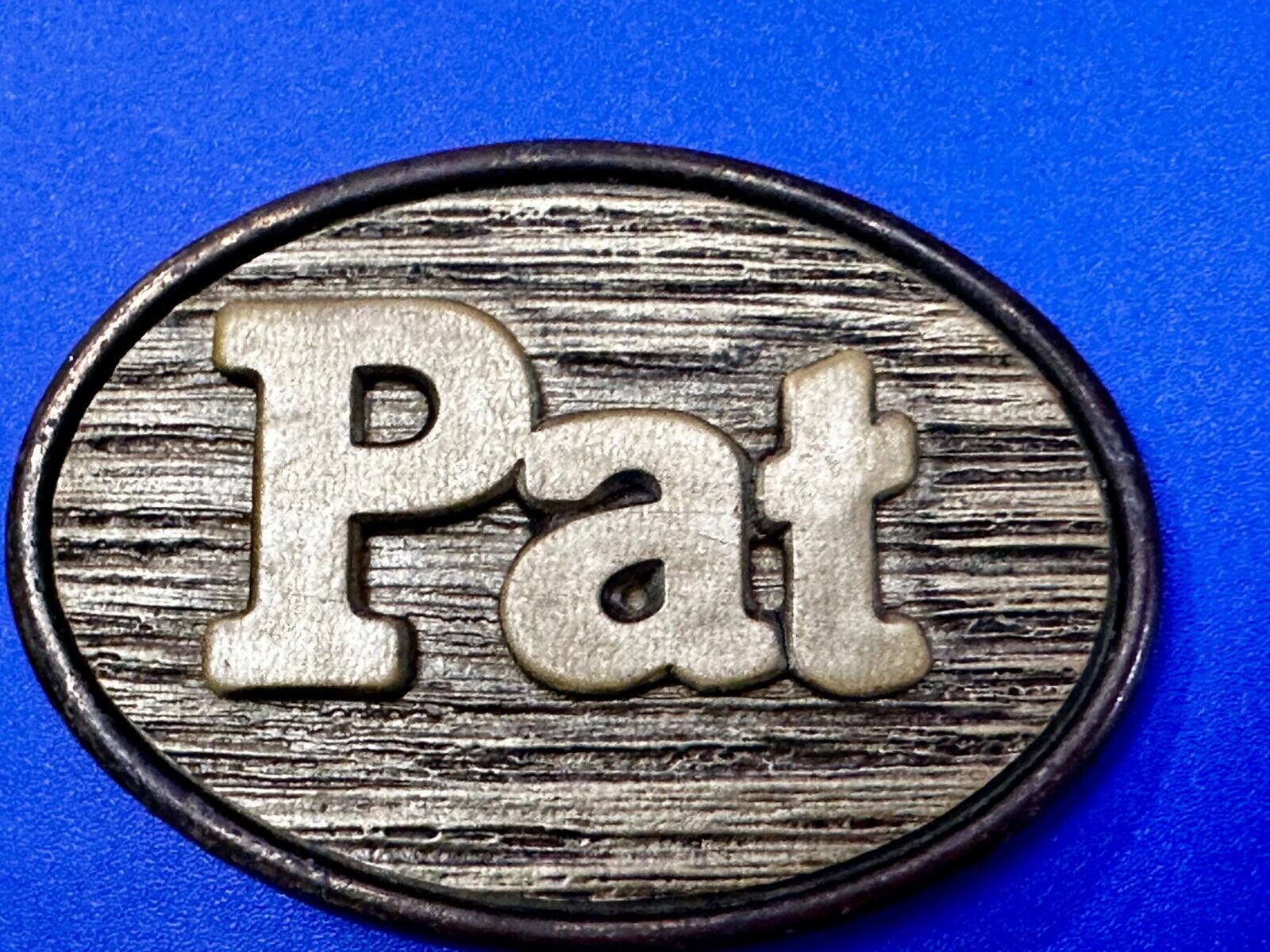 1970s  PAT Name - Custom Wood Grain Metal Oden USA Personalized Belt Buckle