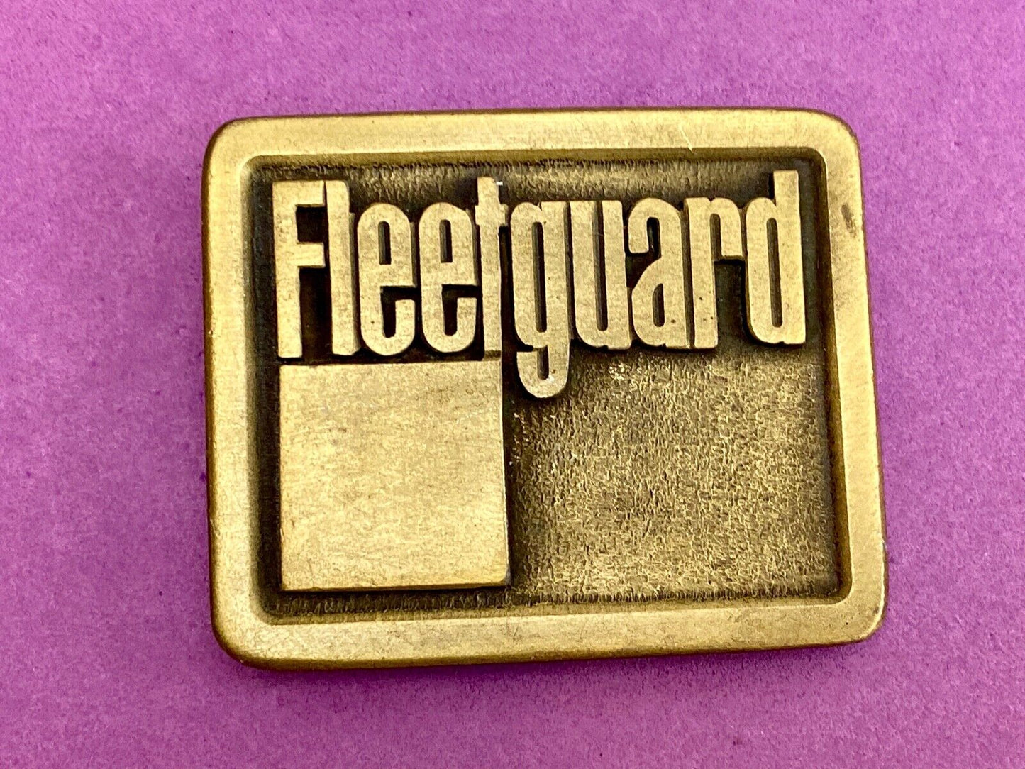 Vintage Fleetguard Construction Equipment Company Advertising Belt Buckle 