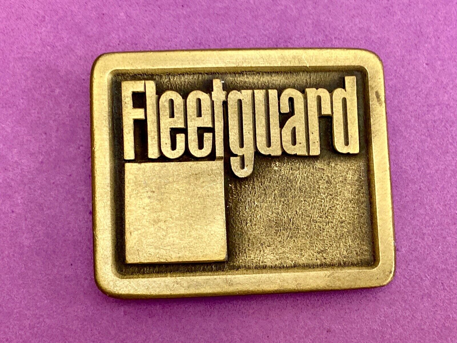 Vintage Fleetguard Construction Equipment Company Advertising Belt Buckle 