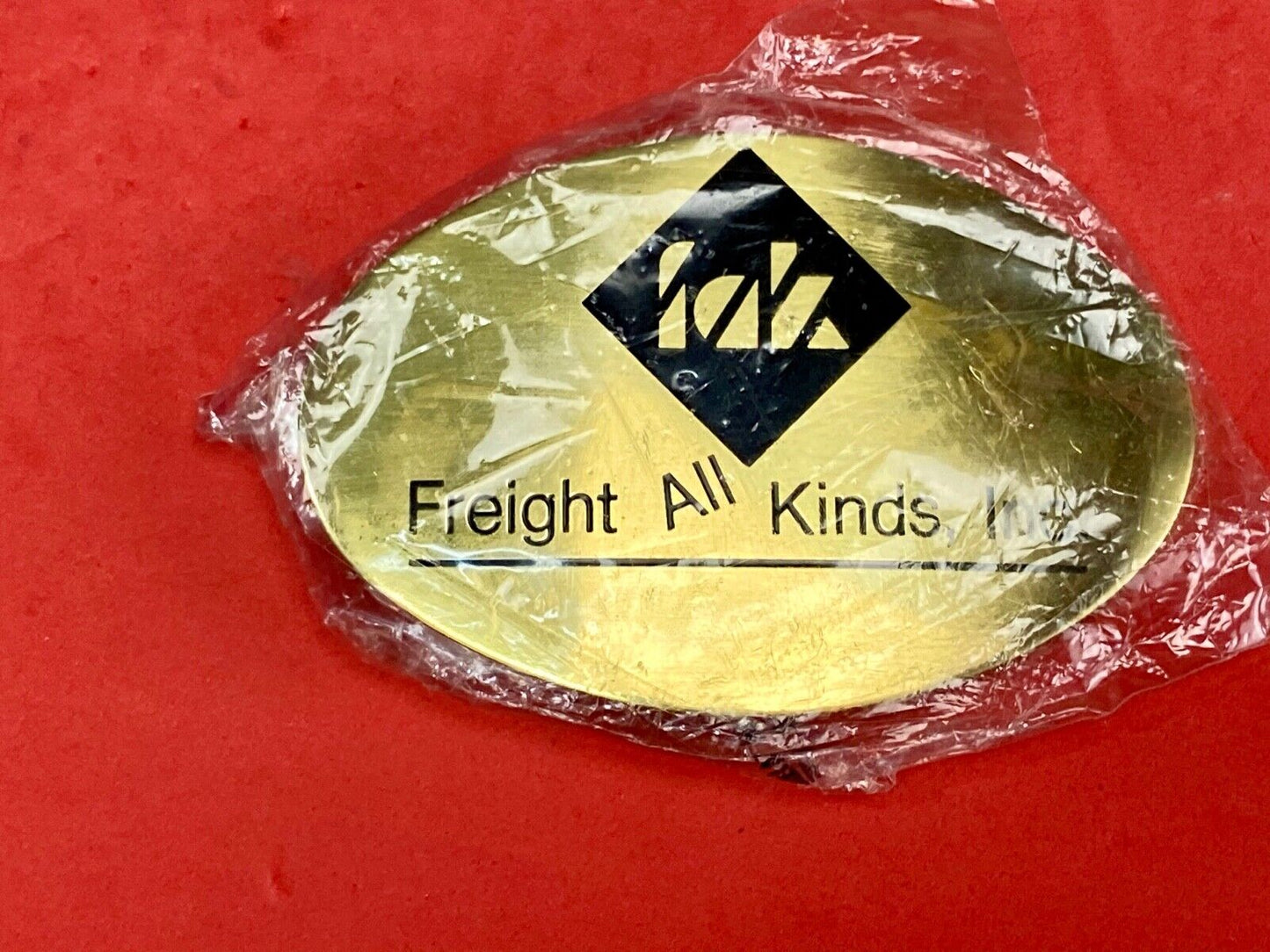 Vintage Freight all kinds, INC. promotional brass belt buckle 