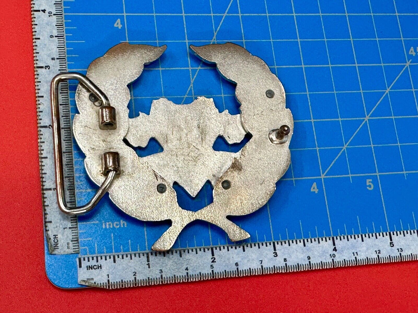 Two griffins?  FME RheJNG Olive branch cutout belt buckle