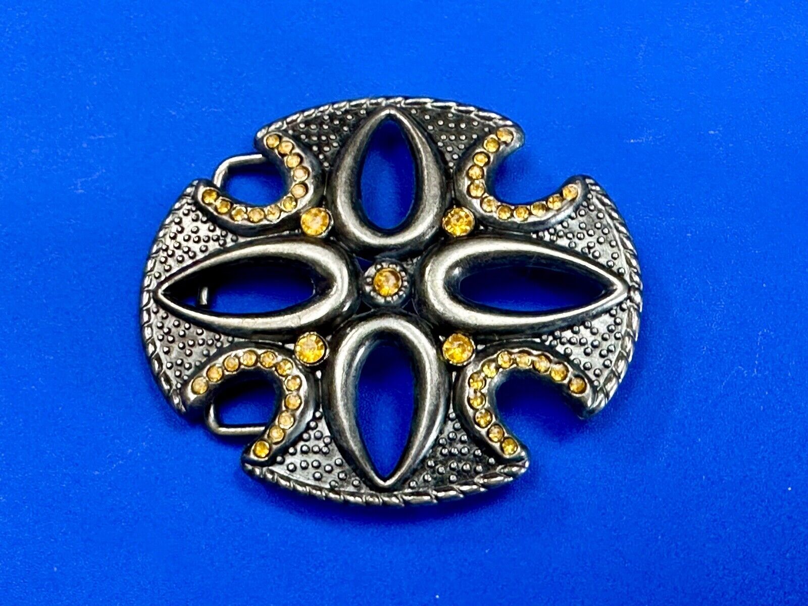 unique see through iron cross with golden brown rhinestone accents