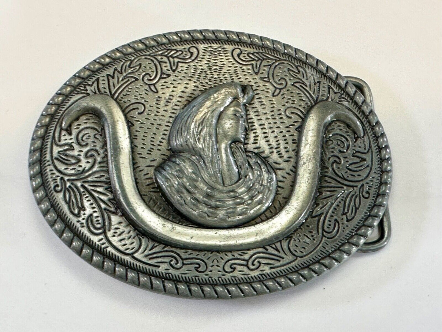 unknown to me!   Man with long hair - longhorn wester belt buckle