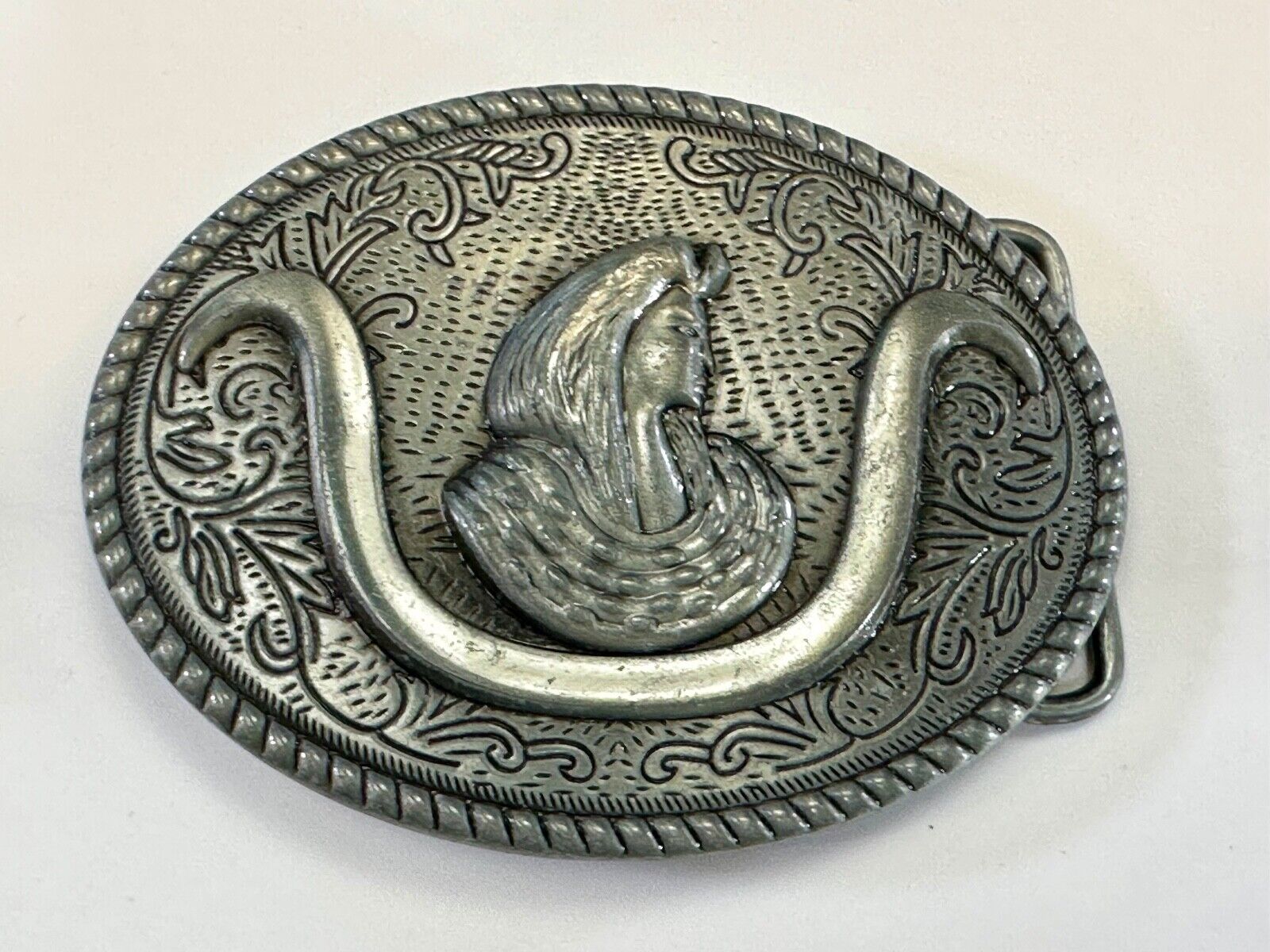 unknown to me!   Man with long hair - longhorn wester belt buckle