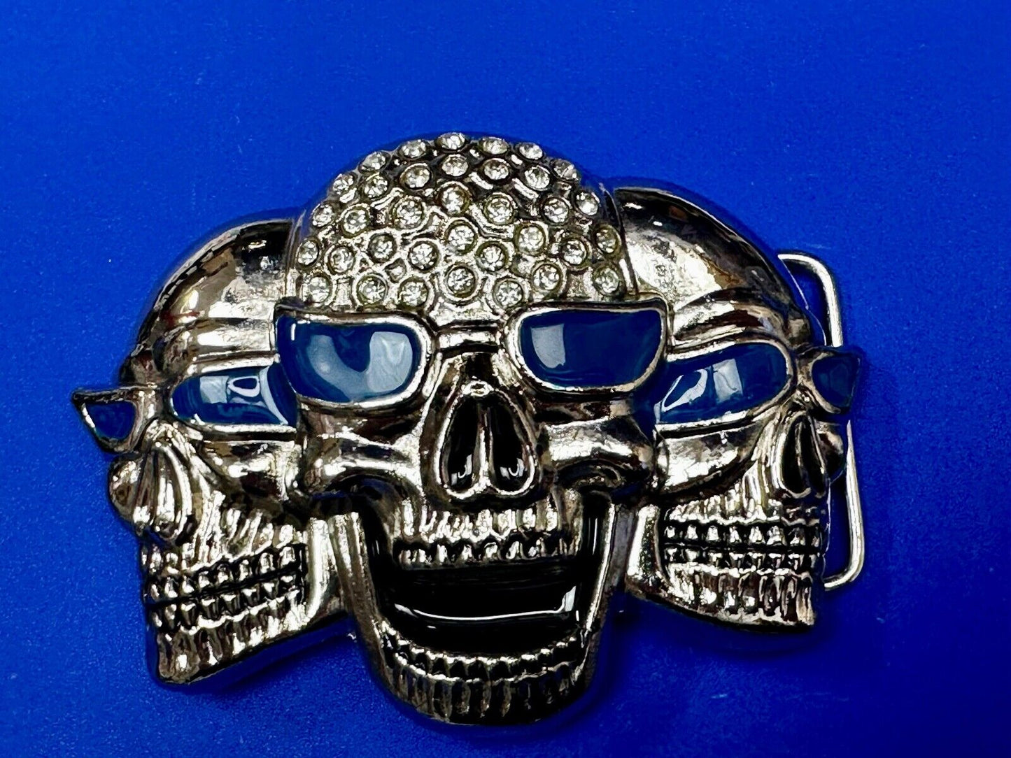 Three Skull's Heads Rhinestone Accented W/ Blue Shades Silver Tone Belt Buckle