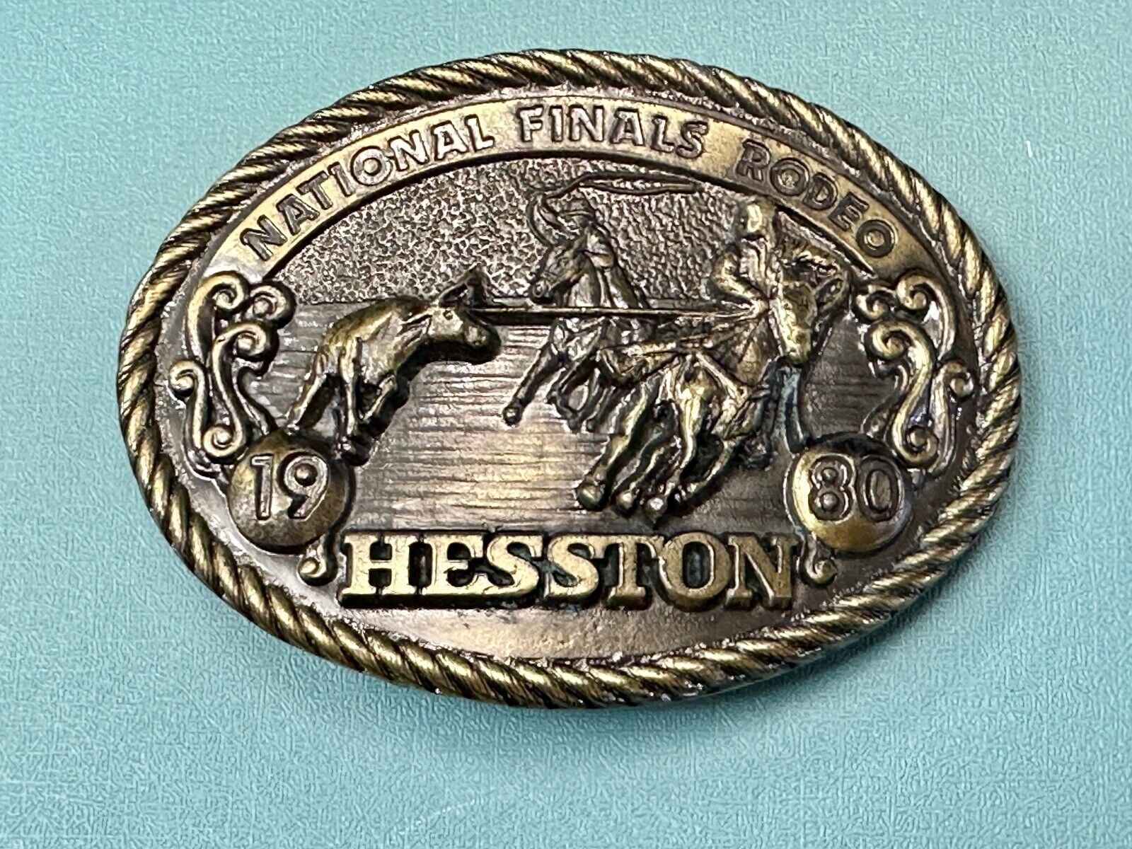 1980 NFR Rodeo Vintage Hesston Cow Roping Steer Wrestling Cowboy belt buckle