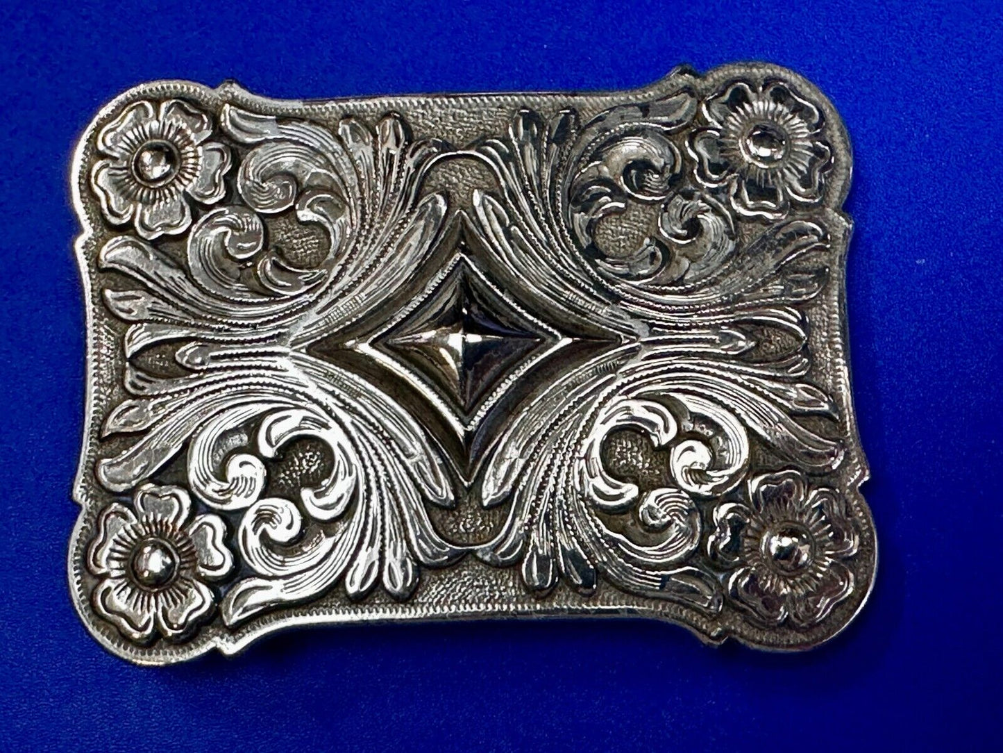 Vintage Ivan Brand Raised Diamond Center Flower Swirl Design Belt Buckle