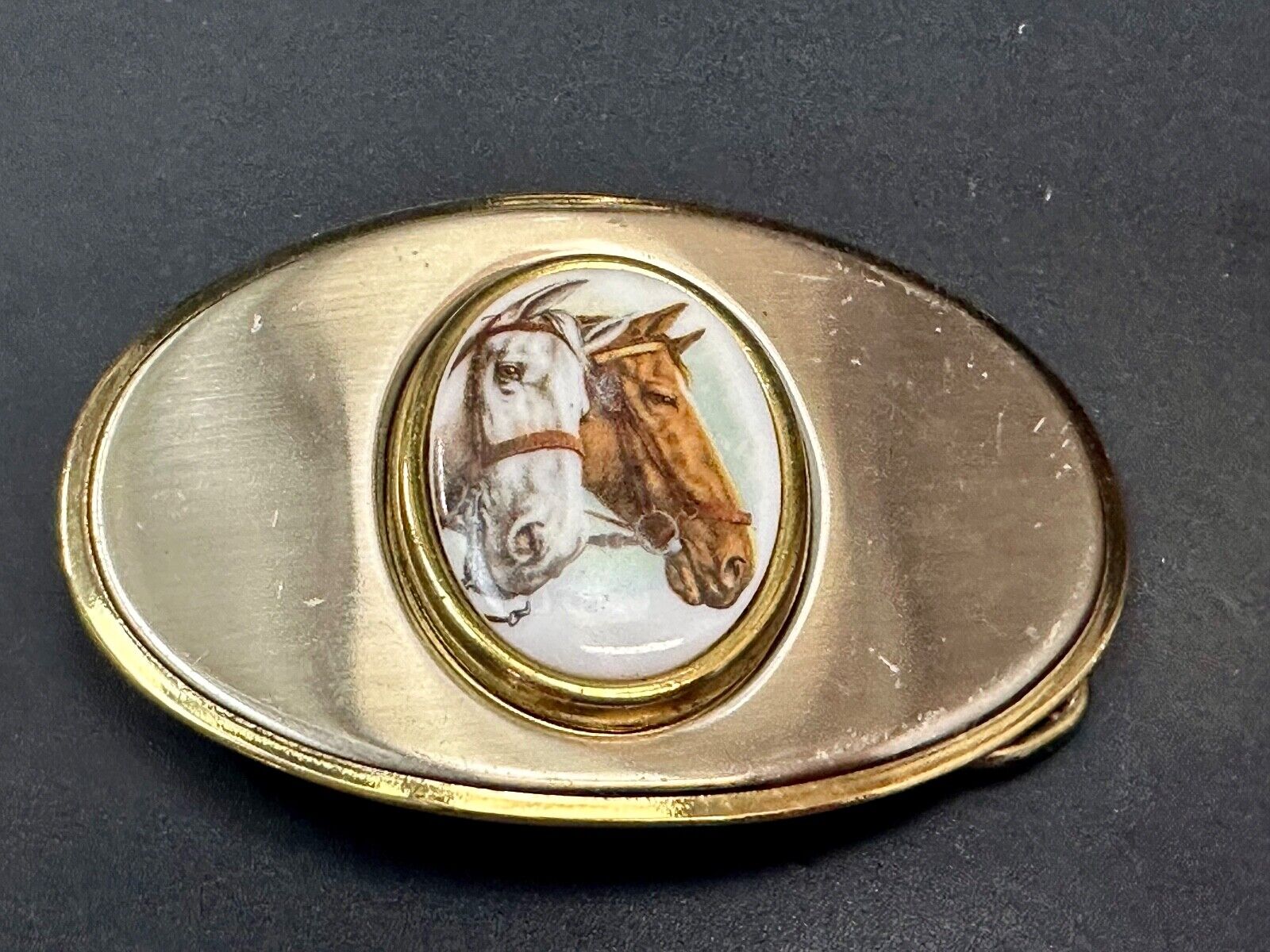 Two horse head picture in oval smooth gold tone Vintage Belt Buckle