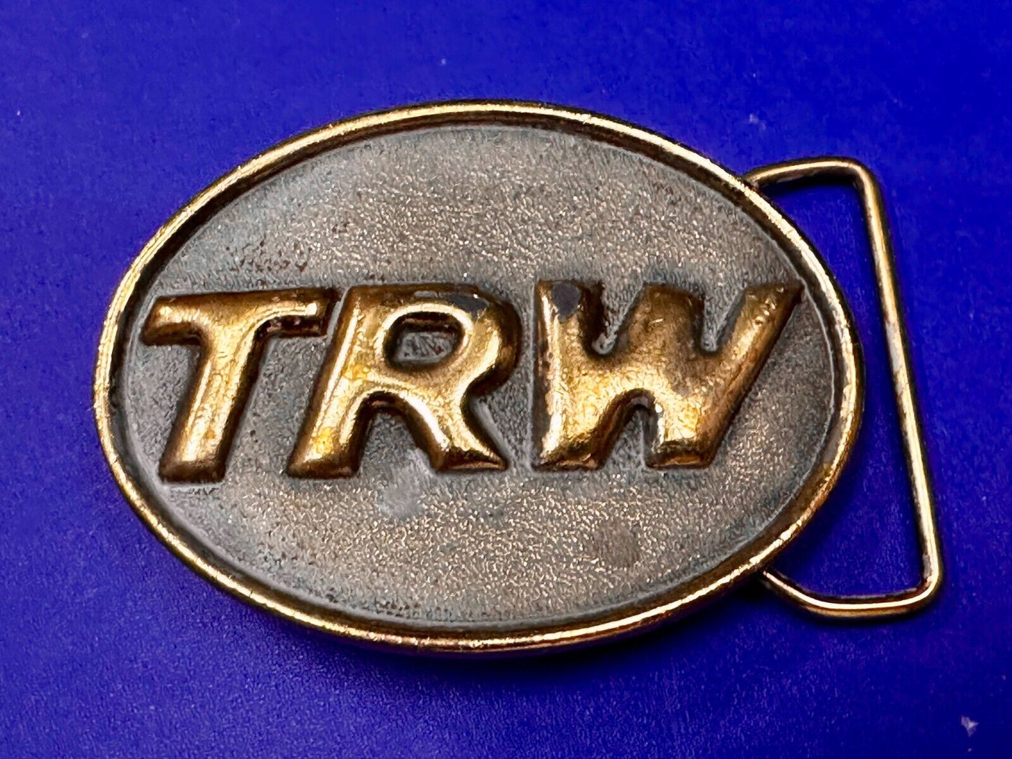 TRW Automotive Parts Advertising Vintage Belt Buckle by Indiana Metal Craft