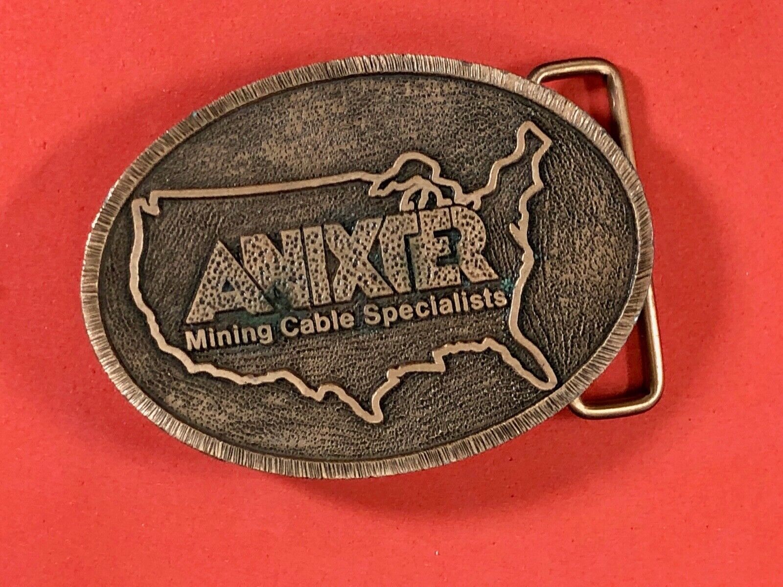 Anixter Mining Cable Specialists company promotional belt buckle by Hit Line 