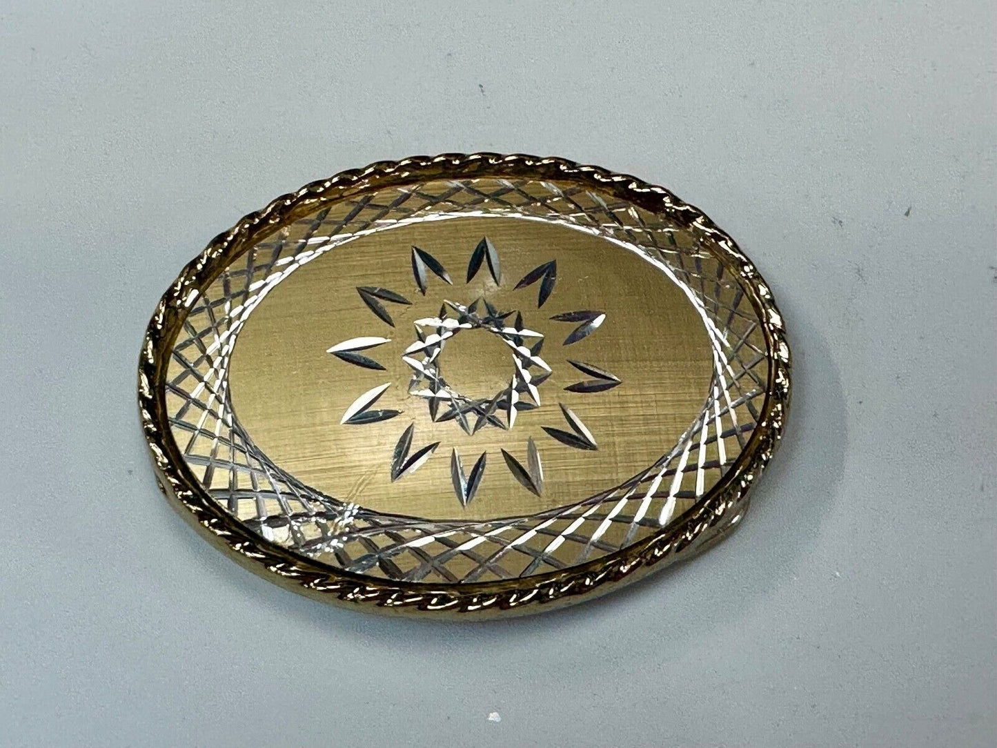 vintage gold tone starburst design oval belt buckle marked W